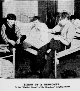 Sizing Up A Newcomer In the "Waldorf Room" of the Newsboys' Lodging House.